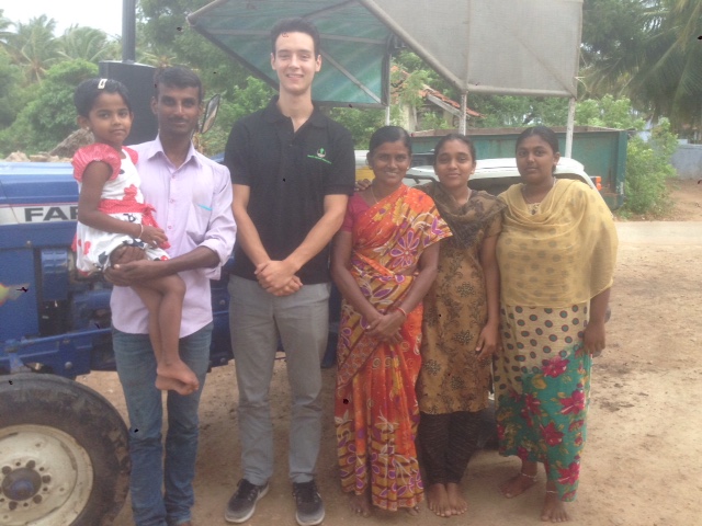 Nick Stewart with a farming family.